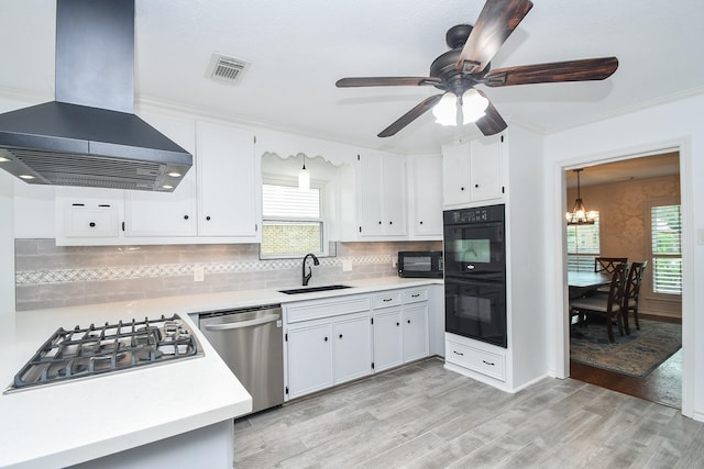 14619 Rosehill Dr, Houston, TX 77070 - kitchen with black appliances, island exhaust hood, a sink, a chandelier, and light countertops