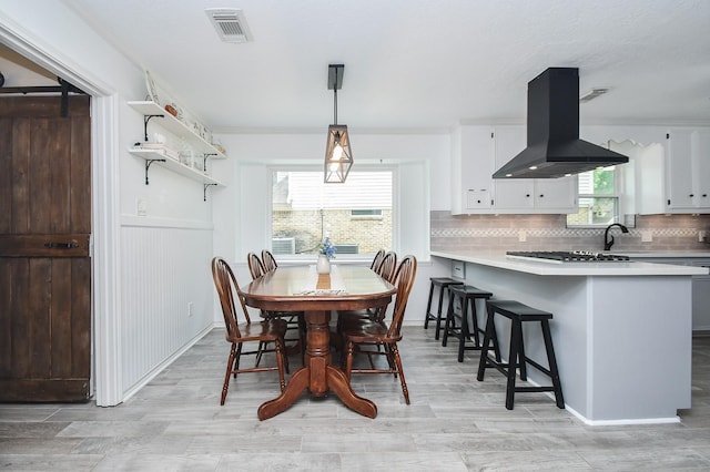14619 Rosehill Dr, Houston, TX 77070 - dining area with ornamental molding and light wood-type flooring