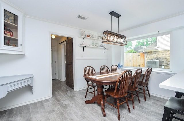 14619 Rosehill Dr, Houston, TX 77070 - dining space with ornamental molding and light wood-type flooring