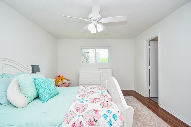 14619 Rosehill Dr, Houston, TX 77070 - bedroom featuring dark wood-style flooring, baseboards, and a ceiling fan