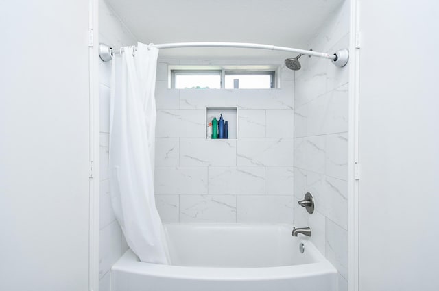 14619 Rosehill Dr, Houston, TX 77070 - bathroom with shower / tub combo with curtain
