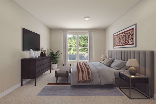 carpeted bedroom with baseboards