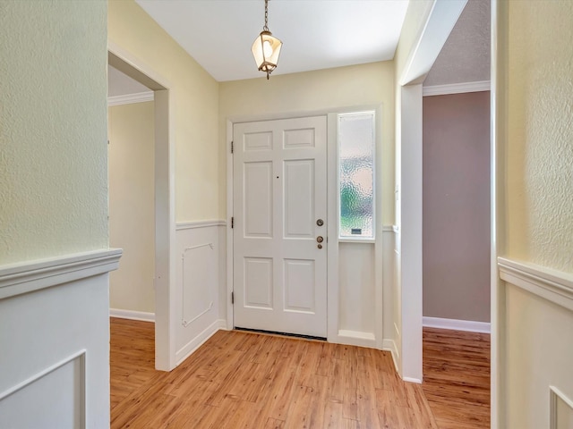 208 Burnett Dr, Baytown, TX 77520 - entrance foyer featuring light wood-style floors and baseboards
