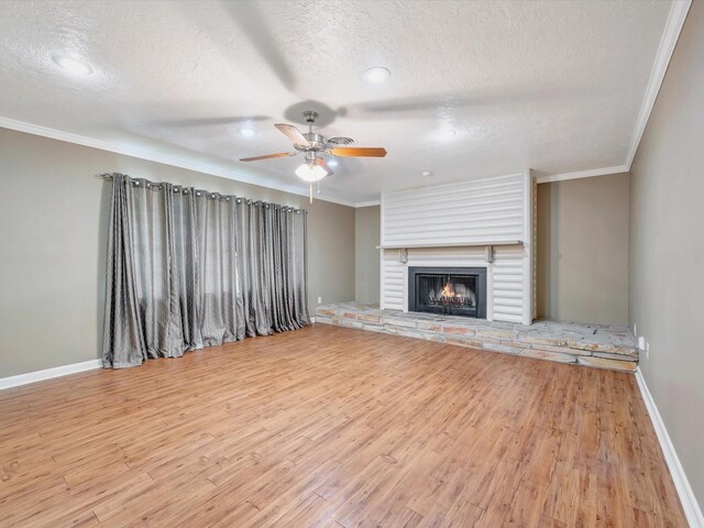 208 Burnett Dr, Baytown, TX 77520 - unfurnished living room with crown molding, a textured ceiling, ceiling fan, and wood finished floors