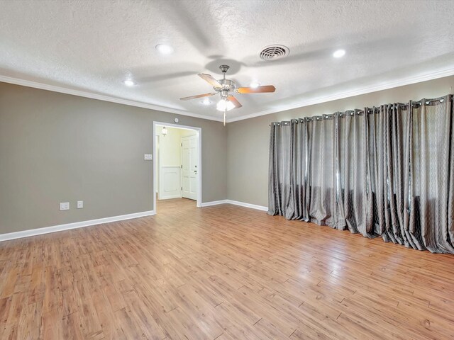 208 Burnett Dr, Baytown, TX 77520 - unfurnished room with crown molding, ceiling fan, and a textured ceiling