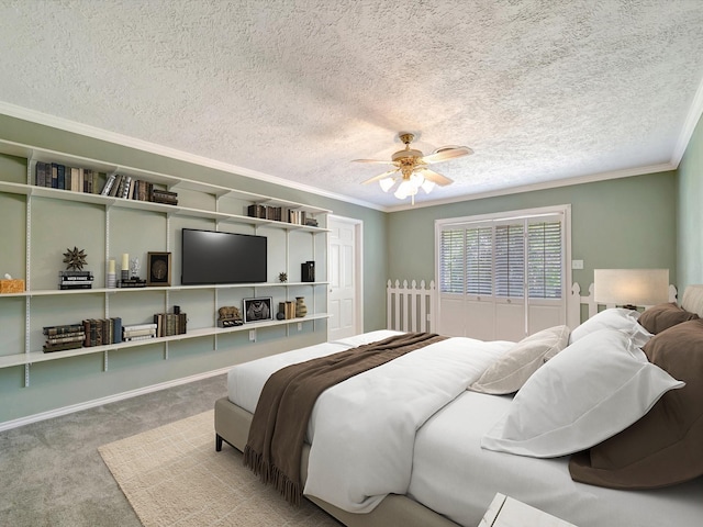 208 Burnett Dr, Baytown, TX 77520 - bedroom with carpet floors, a textured ceiling, a ceiling fan, baseboards, and ornamental molding