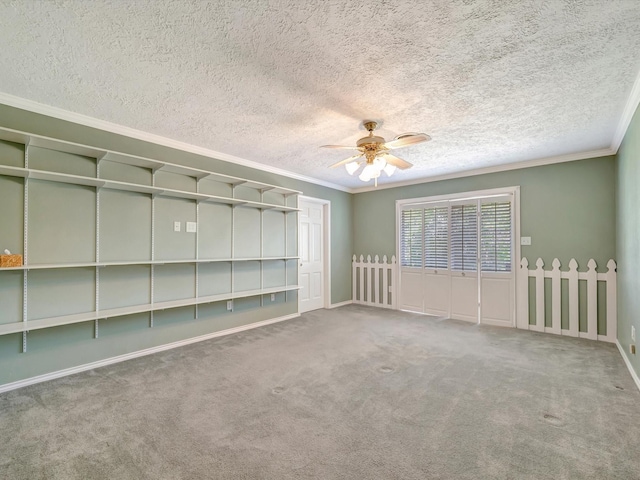 208 Burnett Dr, Baytown, TX 77520 - carpeted spare room with baseboards, ornamental molding, a textured ceiling, and ceiling fan