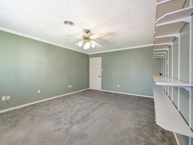 208 Burnett Dr, Baytown, TX 77520 - spare room featuring visible vents, carpet floors, baseboards, a textured ceiling, and a ceiling fan