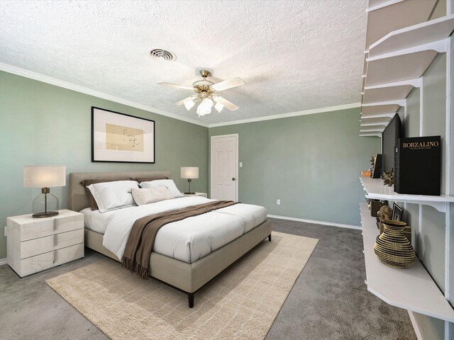 208 Burnett Dr, Baytown, TX 77520 - bedroom with a textured ceiling, visible vents, baseboards, ornamental molding, and carpet flooring