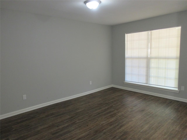 15770 Chimney Rock Rd, Houston, TX 77489 - spare room with dark wood finished floors and baseboards