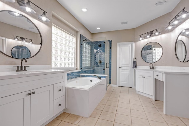16015 Maycrest Ct, Tomball, TX 77377 - full bathroom featuring a sink, tile patterned flooring, visible vents, a bath, and a stall shower
