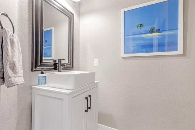 16015 Maycrest Ct, Tomball, TX 77377 - bathroom with vanity and a textured wall