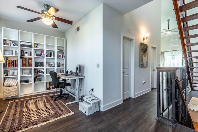 office featuring baseboards, visible vents, wood finished floors, and ceiling fan