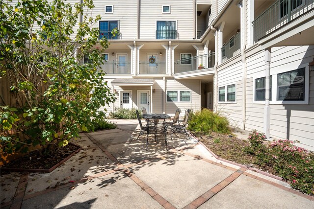 view of patio featuring outdoor dining area