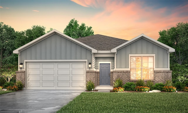 view of front facade featuring driveway, an attached garage, board and batten siding, and brick siding