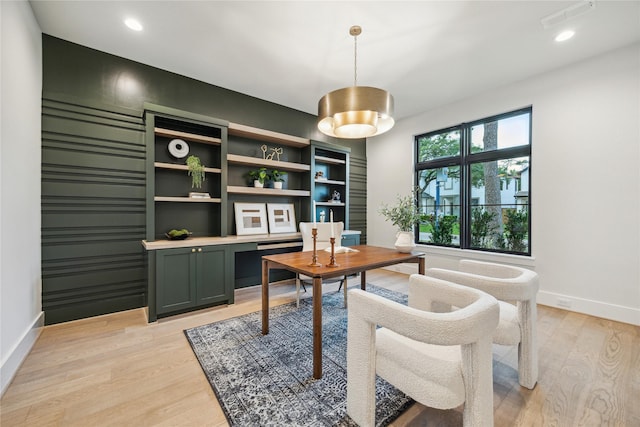 home office with recessed lighting, visible vents, baseboards, and light wood-style floors