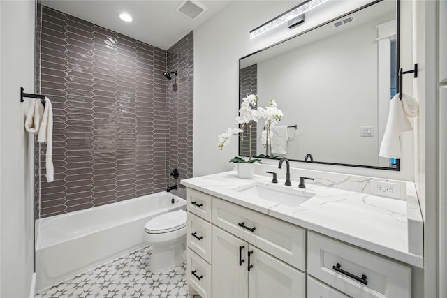 full bath featuring visible vents, toilet, shower / washtub combination, and vanity