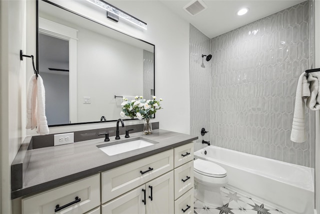 bathroom featuring visible vents, toilet, recessed lighting, shower / washtub combination, and vanity