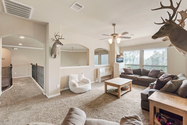 21735 Lozar Dr, Spring, TX 77379 - living room with carpet, a ceiling fan, and visible vents
