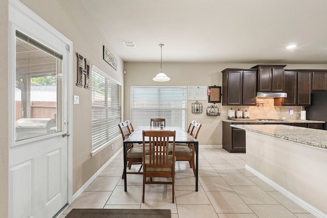 21735 Lozar Dr, Spring, TX 77379 - dining room with visible vents, baseboards, and light tile patterned flooring