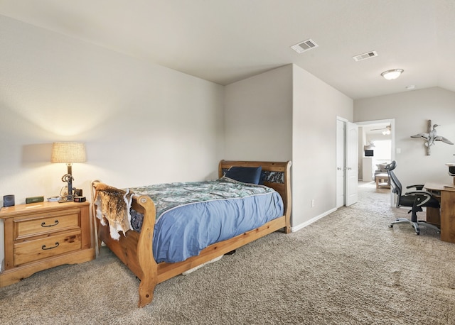 21735 Lozar Dr, Spring, TX 77379 - carpeted bedroom featuring baseboards, visible vents, and lofted ceiling