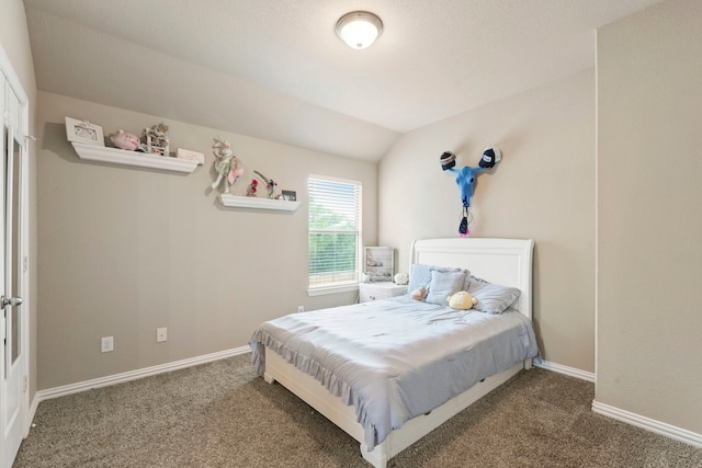 21735 Lozar Dr, Spring, TX 77379 - bedroom featuring carpet floors, baseboards, and lofted ceiling