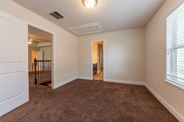 2623 Holbrook Springs Ln, League City, TX 77573 - carpeted empty room featuring attic access, visible vents, and baseboards