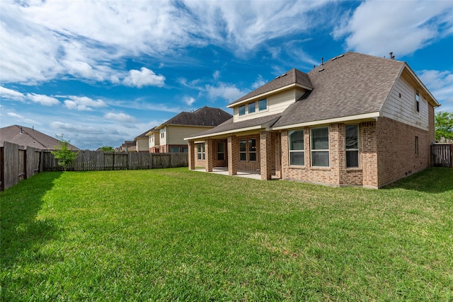 2623 Holbrook Springs Ln, League City, TX 77573 - rear view of property with a patio, a lawn, a fenced backyard, and brick siding