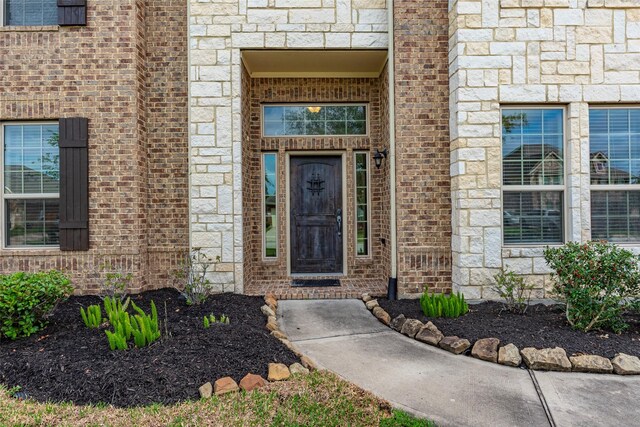 2623 Holbrook Springs Ln, League City, TX 77573 - view of exterior entry with stone siding and brick siding