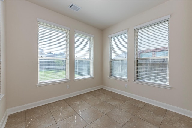 2623 Holbrook Springs Ln, League City, TX 77573 - unfurnished room featuring visible vents, baseboards, and plenty of natural light