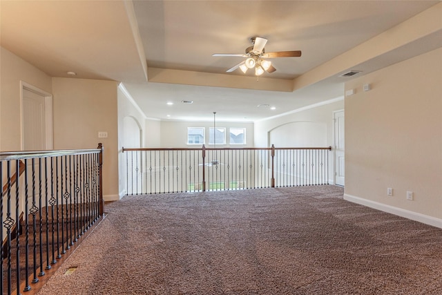 2623 Holbrook Springs Ln, League City, TX 77573 - spare room featuring a raised ceiling, ceiling fan, carpet floors, and visible vents