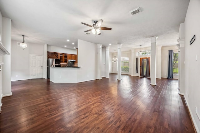unfurnished living room featuring plenty of natural light, ceiling fan, dark wood-style flooring, and recessed lighting