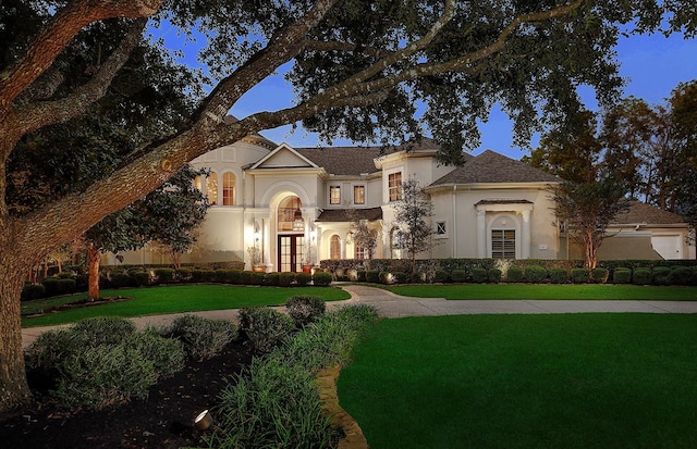 8 Autumn Cres, The Woodlands, TX 77381 - view of front facade with stucco siding and a front yard