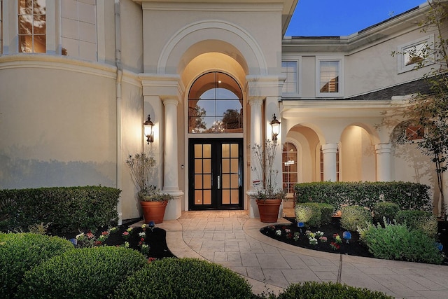 8 Autumn Cres, The Woodlands, TX 77381 - entrance to property with stucco siding and french doors