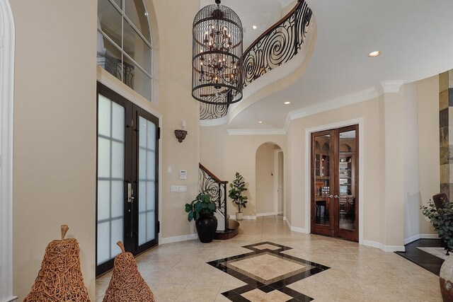 8 Autumn Cres, The Woodlands, TX 77381 - foyer with recessed lighting, arched walkways, french doors, and baseboards