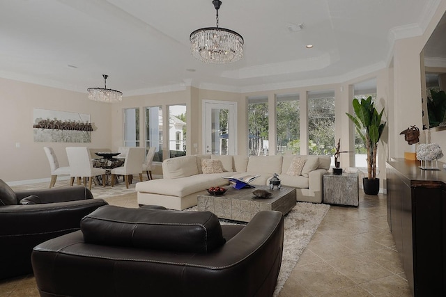 8 Autumn Cres, The Woodlands, TX 77381 - living room featuring crown molding, a notable chandelier, and baseboards
