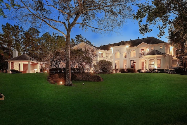 8 Autumn Cres, The Woodlands, TX 77381 - mediterranean / spanish home featuring stucco siding and a front yard