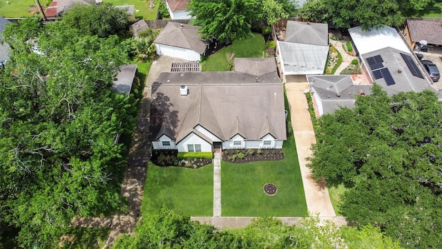 birds eye view of property with a residential view
