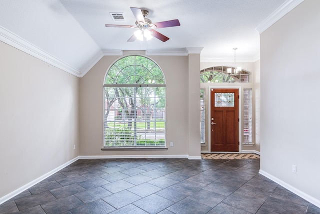 foyer featuring ceiling fan with notable chandelier, a healthy amount of sunlight, ornamental molding, and baseboards