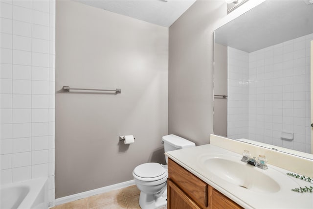 full bath featuring tile patterned floors, vanity, toilet, and baseboards