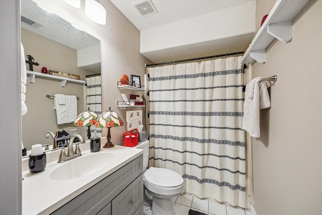 bathroom with toilet, a shower with curtain, visible vents, and vanity