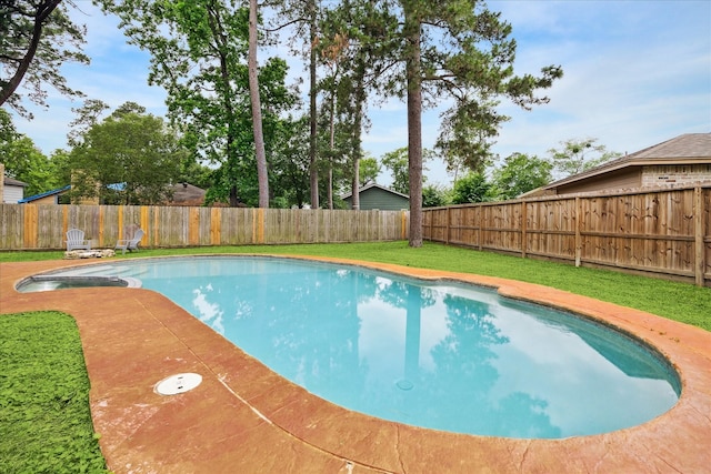 view of pool featuring a fenced in pool, a lawn, and a fenced backyard