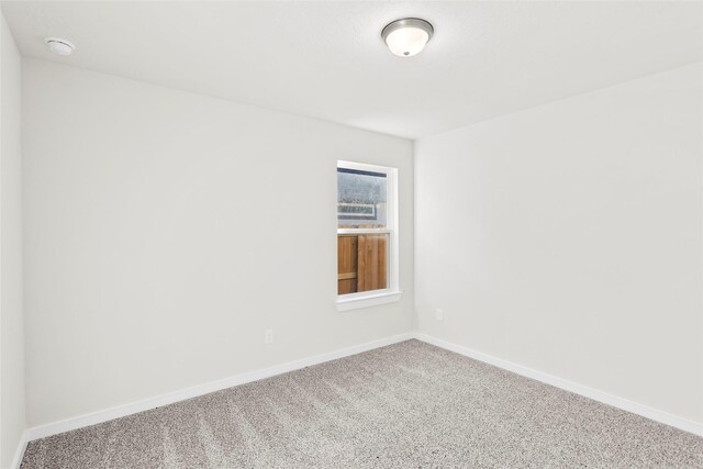 520 Shoreview Dr, Conroe, TX 77303 - empty room featuring baseboards and carpet floors