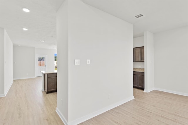 520 Shoreview Dr, Conroe, TX 77303 - corridor with visible vents, recessed lighting, light wood-style flooring, and baseboards