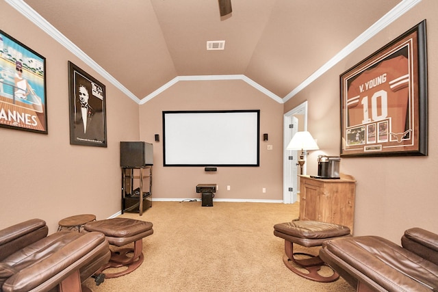 cinema room featuring a ceiling fan, visible vents, vaulted ceiling, carpet floors, and baseboards