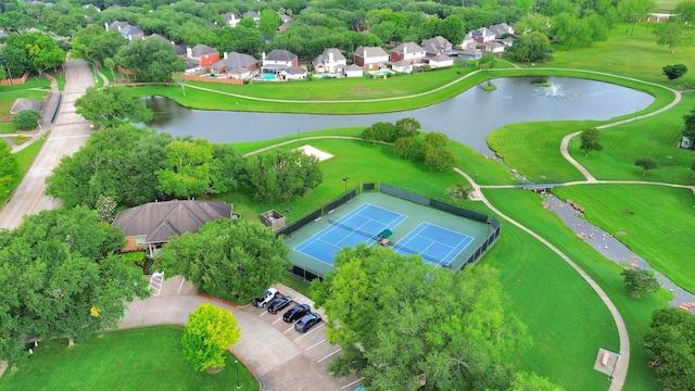 aerial view with a residential view and a water view