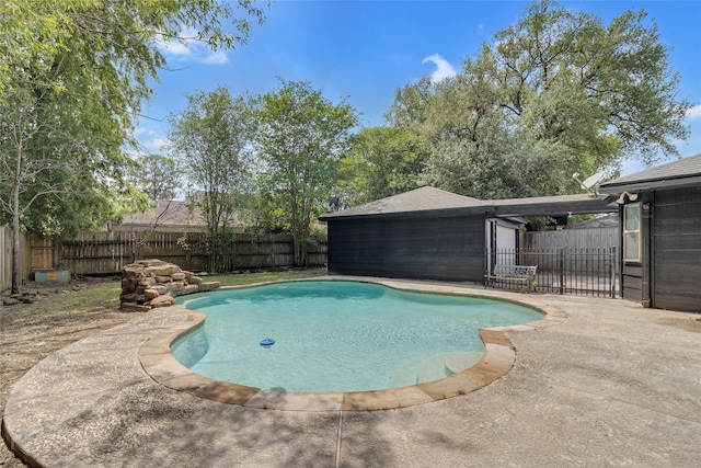 view of pool featuring a fenced in pool, a fenced backyard, and a patio area