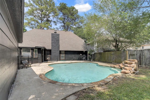 view of pool with a patio, a fenced backyard, and a fenced in pool