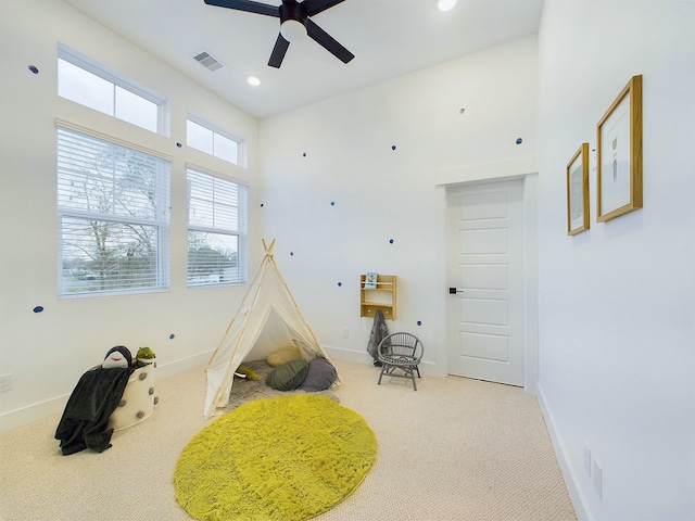 recreation room with carpet flooring, visible vents, ceiling fan, baseboards, and recessed lighting