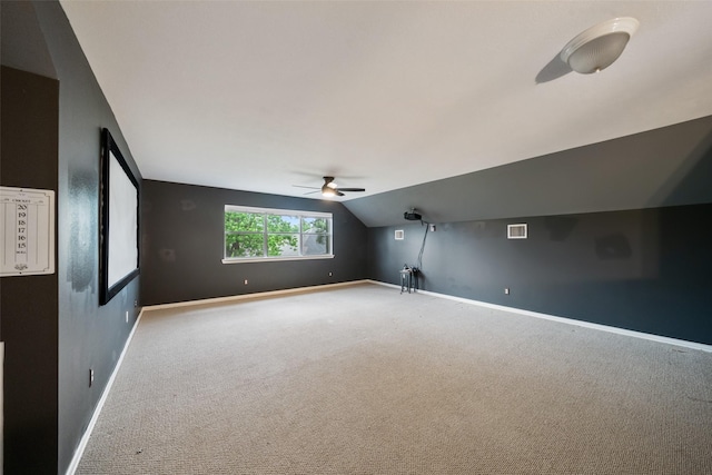 15015 Cozy Hollow Ln, Houston, TX 77044 - additional living space with a ceiling fan, carpet flooring, baseboards, and vaulted ceiling